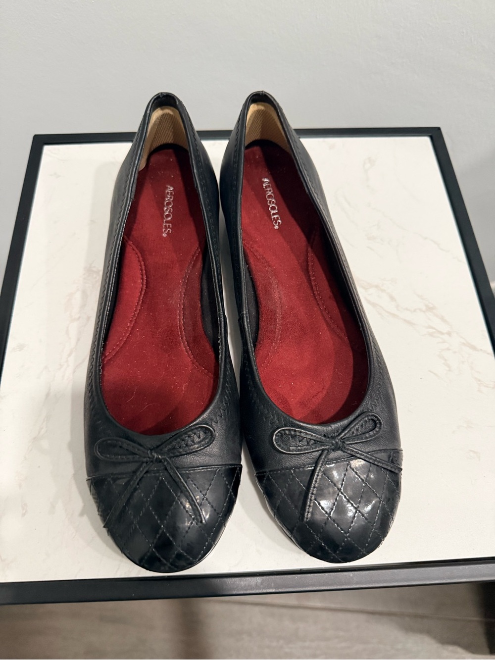 AEROSOLES Black Quilted Toe Flats with Red Insole